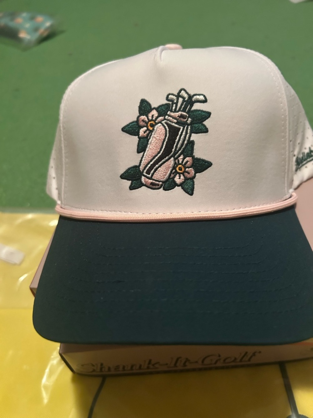 Birdieboss Azeala White and Dark Green Golf Trucker Hat with Pink Trim